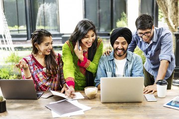 Wall Mural - Friends Technology Devices Smiling Indoors Concept