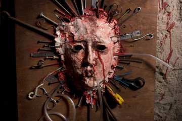 Fototapeta close up of a skinned bloody face of a person stretched open on