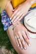 © serbogachuk - Close up of hands of woman showing the ring. Trendy youth style. Care, Fashion. Manicure Gel