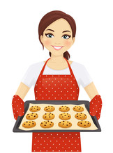 Smiling Woman Holding Baking Tray With Homemade Cookies Wearing Apron Isolated