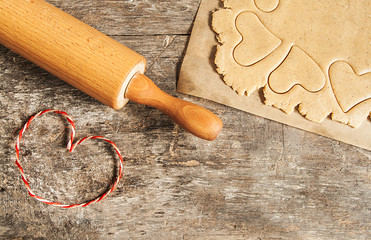 Wall Mural - Roll out the dough to cut out heart shapes