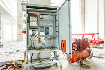 Electricity distribution box with wires and circuit breakers. Fu