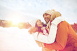 © Syda Productions - happy couple hugging outdoors in winter