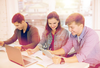 Wall Mural - students with laptop, notebooks and tablet pc
