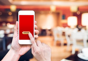 Aufkleber - Hand holding mobile with order button and empty screen for addin