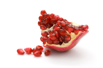 Wall Mural - piece of pomegranate isolated on white background