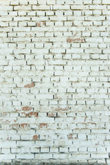 Old weathered white brick wall. Vintage texture Background.