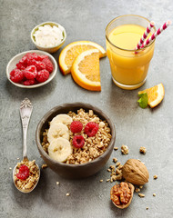 Wall Mural - bowl of muesli with fresh berries and banana