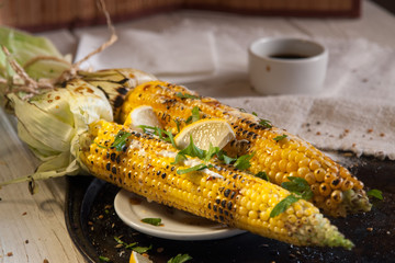 Poster - grilled corn on with lemon, herbs and spices