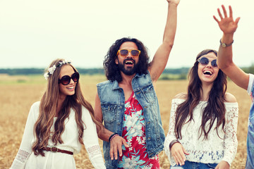 Sticker - happy young hippie friends dancing on cereal field