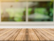 © tirachard - Wooden board empty table top on of blurred background. Perspective brown wood table over blur in coffee shop background - can be used mock up for montage products display or design key visual layout.