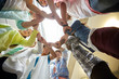 © Syda Productions - group of international students holding hands