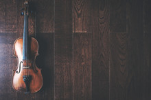Full Length Violin On Wooden Floor