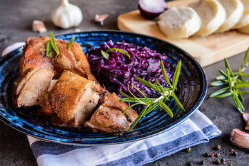 Wall Mural - Roasted duck with stewed red cabbage and dumplings