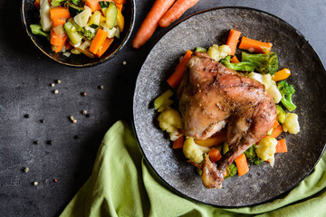 Wall Mural - Roasted chicken leg with steamed vegetable