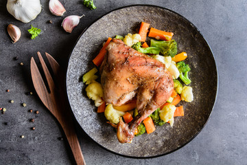 Wall Mural - Roasted chicken leg with steamed vegetable