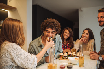 Wall Mural - Enjoying junk food