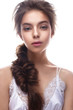 © iulskaya_photo - Beautiful girl in image of bride with plait. Model with nude makeup and silk underwear. Beauty face. Photo was taken in a studio.