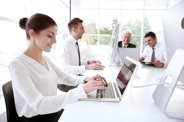 Wall Mural - Business training concept. Colleagues working on computers at office