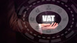 Businessman holding a VAT concept.