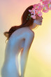 nude beautiful woman with flower