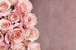 Border of roses with textured background