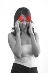 headache or migraine or stress symptom of woman with her hand ho