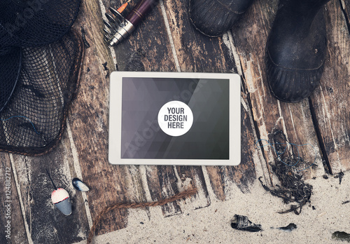 Download Tablet With Scattered Fishing Gear Mockup Stock Mal Adobe Stock
