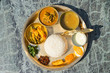 Traditional Nepalese food - thali (dal bhat) in a restaurant.  Overhead view. Selective focus.
