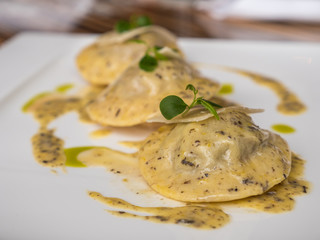 Ravioli in creamy truffle sauce