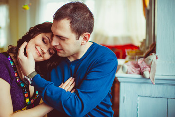 Wall Mural - Tender touch of loving man stroking his wife's face