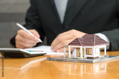 Fotografía Bank checking accounts with a calculator and loan to buy home
