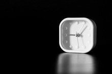 Low Key Object Of White Alarm Clock