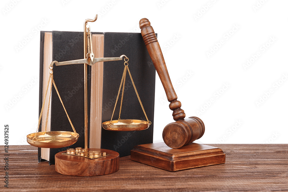 Gavel with books and scales on white background