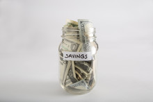 Closeup Of Mason Jar With Money For Savings
