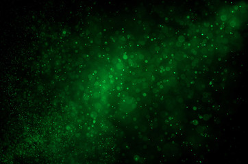 Wall Mural - dark green abstract background with bokeh.