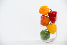 Mixed Bell Peppers In A Glass Vase Full Frame Single On Side Framed Right
