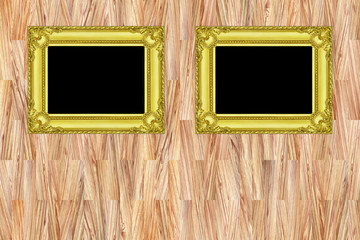 Poster - two gold frames on modern wooden wall background