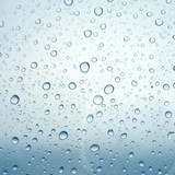 Fototapeta Łazienka - Close-up of water drops on glass surface as background