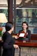 © DragonImages - At reception