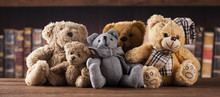 Teddy Bears On On Vintage Wooden Background