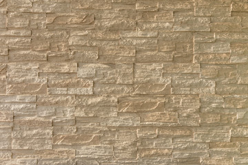 light brown stone brick exterior wall