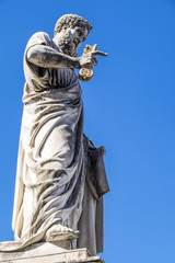 Saint Peter's Statue Holding Golden Key to Heaven in St. Peter's Square in Vatican City