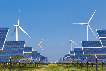 photovoltaics solar panel and wind turbines generating electricity in solar power station alternativ