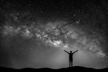 Wall Mural - black and white image of landscape with milky way galaxy. night