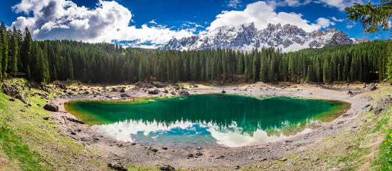 Wall Mural - breathtaking view to mountain carezza lake in dolomites, italy