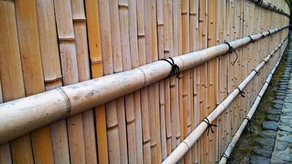 Bamboo fence at Arashiyama Bamboo Grove forest in Kyoto, Japan - Photo taken on November 6th, 2015