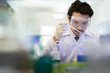 © torwaiphoto - Asian scientist  in the laboratory working at lab with test tube
