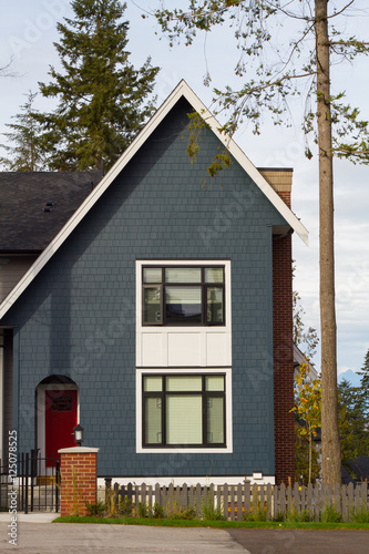Brand New Blue House With Red Door Buy This Stock Photo And
