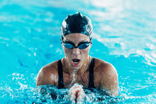 Swimmer. Female Swimmer In The Pool